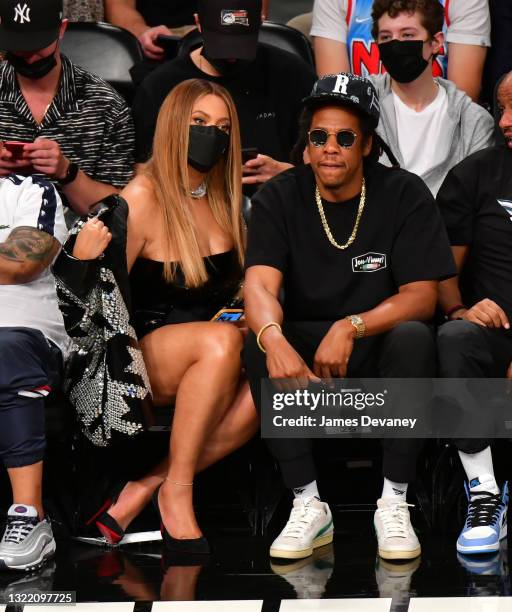 Beyonce and Jay-Z attend Brooklyn Nets v Milwaukee Bucks game at Barclays Center of Brooklyn on June 05, 2021 in New York City.