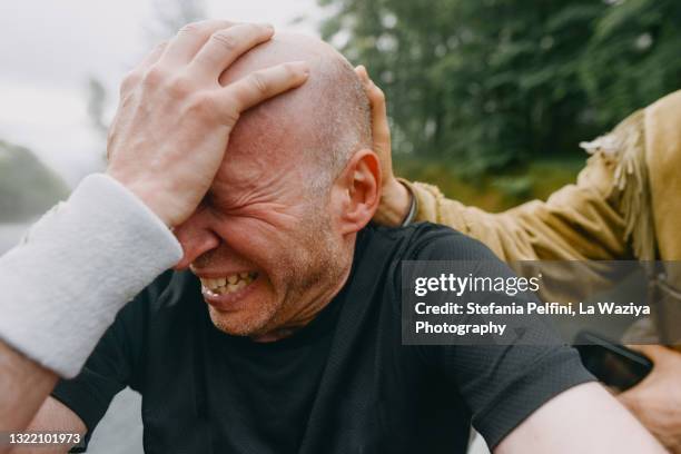 caucasian male sportsperson crying - prop sporting position stock pictures, royalty-free photos & images