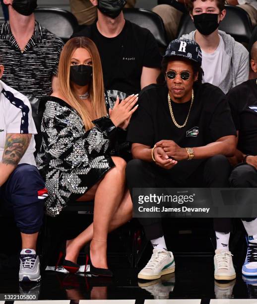 Beyonce and Jay-Z attend Brooklyn Nets v Milwaukee Bucks game at Barclays Center of Brooklyn on June 05, 2021 in New York City.