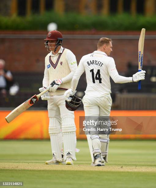 George Bartlett of Somerset celebrates after reaching their century with team mate Tom Banton during Day Four of the LV= Insurance County...