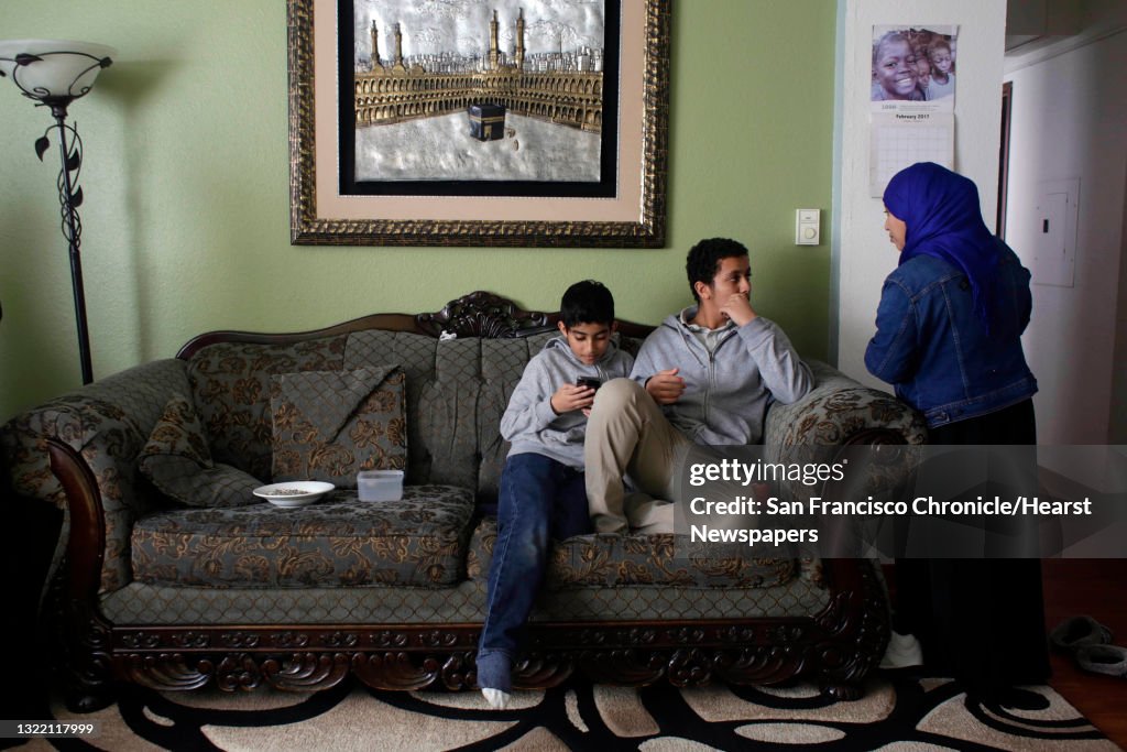 Sheikh Alameri Rashed Nadia Rashed talks with her son Khatab Alameri as he sits on the ...