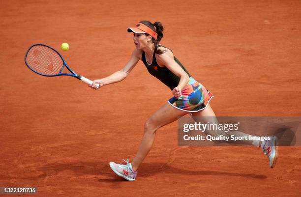 Sorana Cirstea of Romania returns a ball in her Fourth Round match against Tamara Zidansek of Slovenia during day eight of the 2021 French Open at...