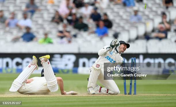 Watling of New Zealand attempts to run out Dom Sibley of England during Day 5 of the First LV= Insurance Test Match between England and New Zealand...