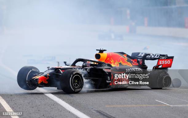 Max Verstappen of the Netherlands driving the Red Bull Racing RB16B Honda crashes during the F1 Grand Prix of Azerbaijan at Baku City Circuit on June...