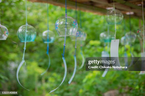 wind bells - summer sounds stock pictures, royalty-free photos & images