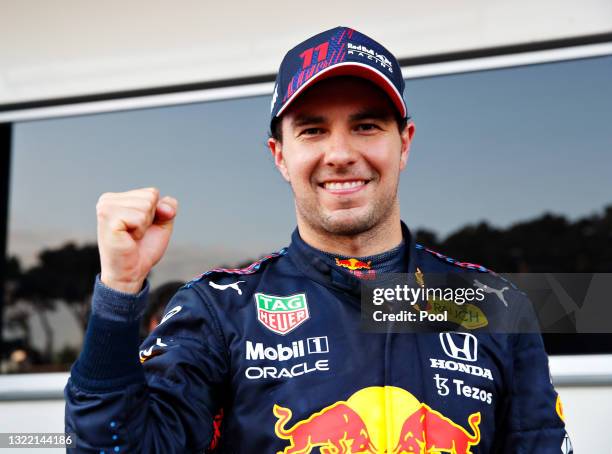 Race winner Sergio Perez of Mexico and Red Bull Racing celebrates in parc ferme during the F1 Grand Prix of Azerbaijan at Baku City Circuit on June...