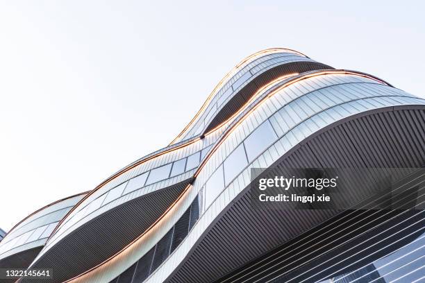facade of modern building in qianjiang new town, hangzhou, china - china abstract photos et images de collection