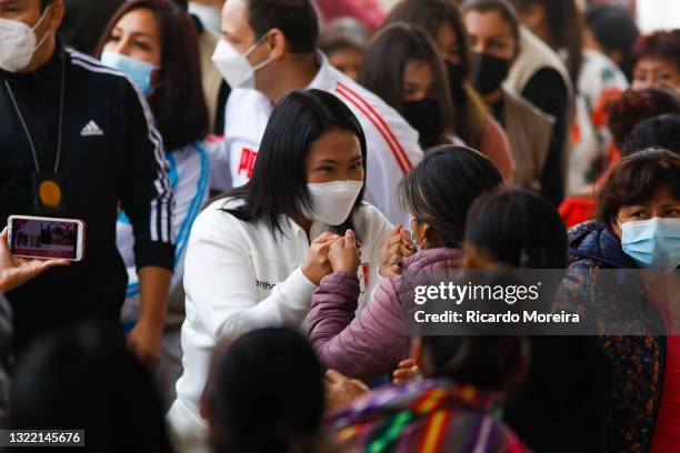 Presidential candidate Keiko Fujimori of Fuerza Popular greets supporters during the traditional breakfast as part of the presidential runoff voting...
