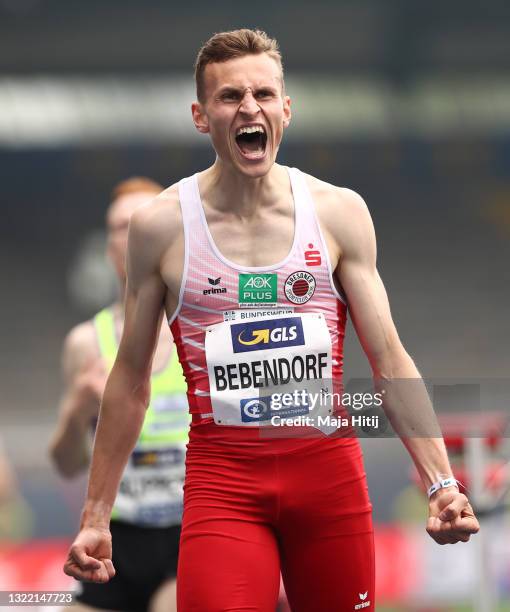 Karl Bebendorf of Dresdner SC 1898 celebrates winning the Men's 3000m Steeplechase Final of the German Athletics Championships 2021 at Eintracht...