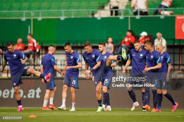 The Slovakia team warm up prior to the international friendly match between Austria and Slovakia at Ernst Happel Stadion on June 06, 2021 in Vienna,...
