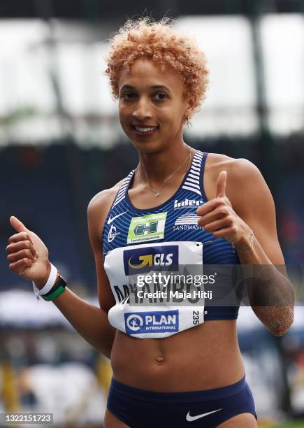 Malaika Mihambo of LG Kurpfalz celebrates winning the Women's Long Jump Final of the German Athletics Championships 2021 at Eintracht Stadion on June...