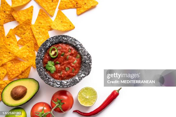 mexican tomato salsa dip sauce with nacho chips and chili isolated on white - tomato sauce isolated stock pictures, royalty-free photos & images