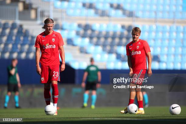 Erling Haaland and Martin Odegaard of Norway warms up prior to the International Friendly match between Norway and Greece at Estadio La Rosaleda on...