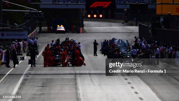 The cars prepare on the grid during the F1 Grand Prix of Azerbaijan at Baku City Circuit on June 06, 2021 in Baku, Azerbaijan.