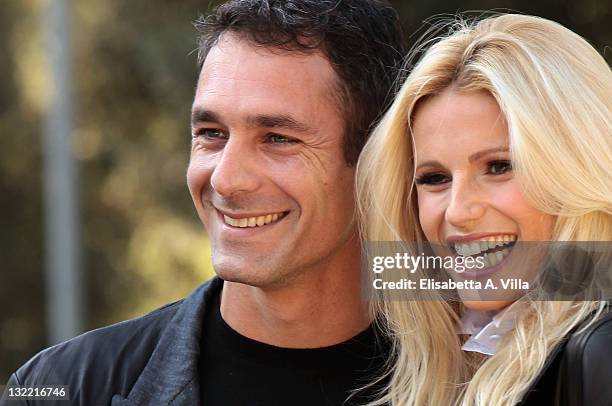 Director Raoul Bova and actress Michelle Hunziker attend 'Amore Nero' photocall at Villa Borghese on November 11, 2011 in Rome, Italy.