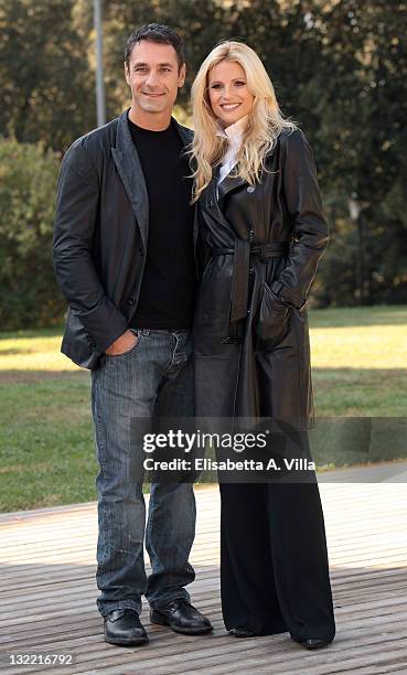 Director Raoul Bova and actress Michelle Hunziker attend 'Amore Nero' photocall at Villa Borghese on November 11, 2011 in Rome, Italy.