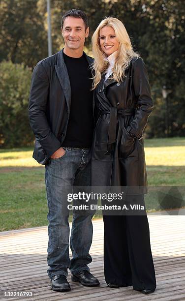 Director Raoul Bova and actress Michelle Hunziker attend 'Amore Nero' photocall at Villa Borghese on November 11, 2011 in Rome, Italy.