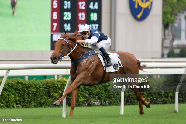 Jockey Chad Schofield riding The Rock wins the Race 10 Chung On Handicap at Sha Tin Racecourse on June 6, 2021 in Hong Kong.