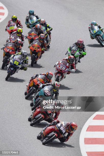 Jeremy Alcoba of Spain and Indonesian Racing Gresini Moto3 leads the field during the Moto3 race during the MotoGP of Catalunya - Race at Circuit de...