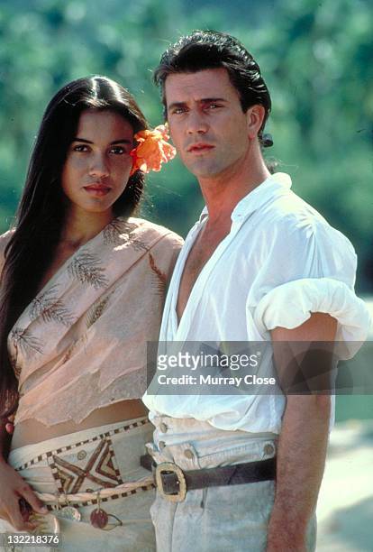 Actor Mel Gibson as mutineer Fletcher Christian and Tevaite Vernette as Mauatua in the film 'The Bounty', 1984.