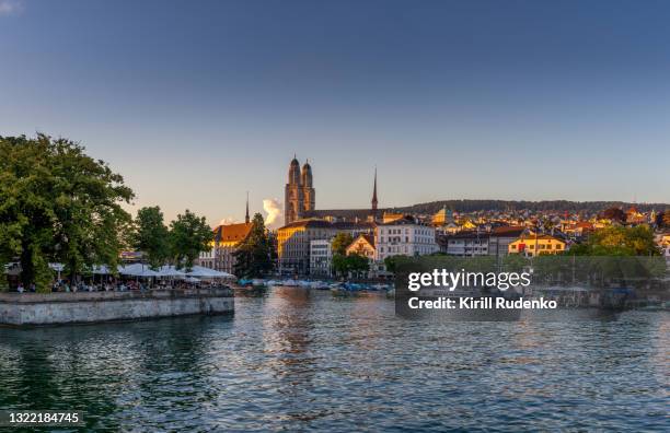 summer evening in zurich - grossmunster cathedral stock pictures, royalty-free photos & images