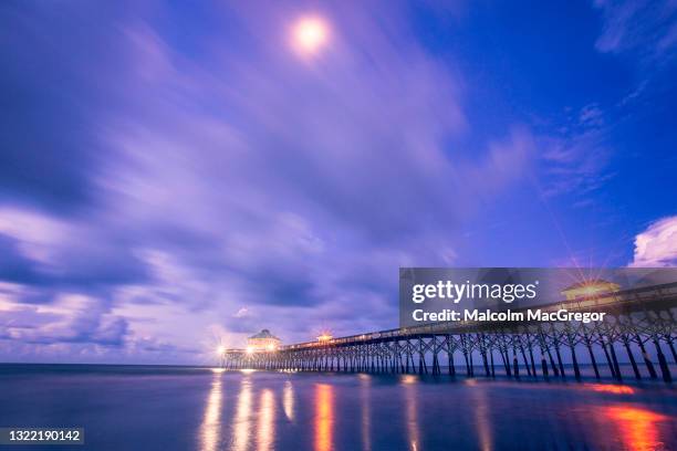 folly beach pier at dawn - south carolina beach stock pictures, royalty-free photos & images
