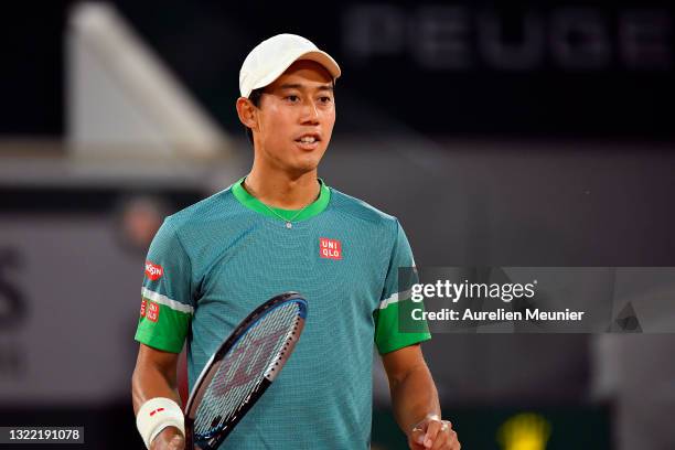Kei Nishikori of Japan reacts during his Men's Singles fourth round match against Alexander Zverev of Germany on day eight of the 2021 French Open at...