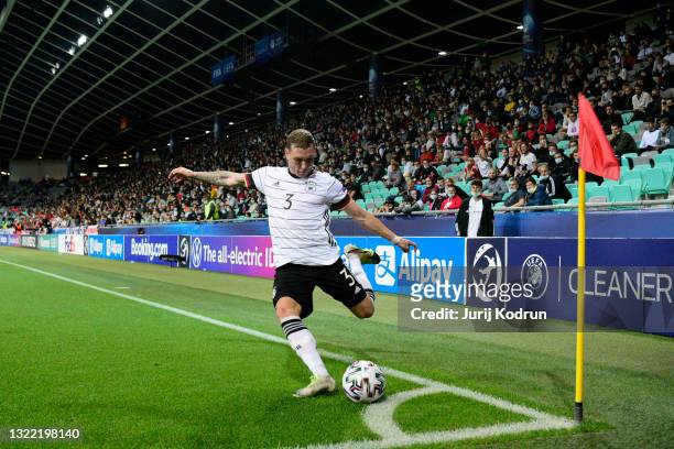 David Raum of Germany takes a corner during the 2021 UEFA European Under-21 Championship Final match between Germany and Portugal at Stadion Stozice...