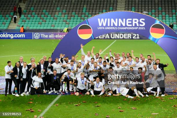 The Germany team celebrate with the UEFA European Under-21 Championship trophy after winning the 2021 UEFA European Under-21 Championship Final match...