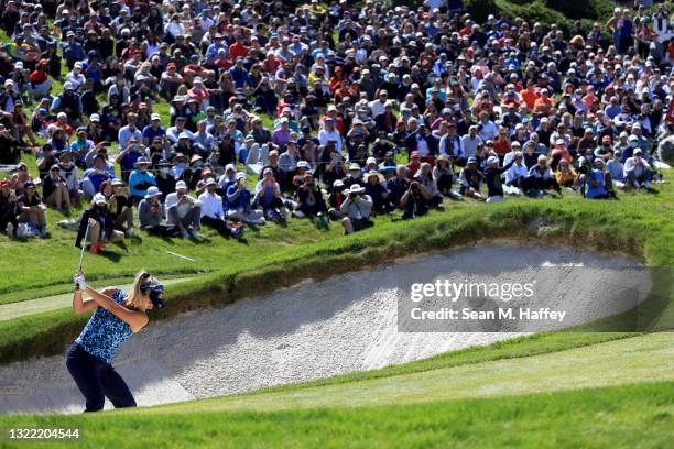 Lexi Thompson of the United States hits from the bunker on the 18th hole during the final round of the 76th U.S. Women's Open Championship at The...