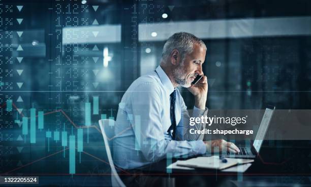 digitally enhanced shot of a handsome businessman using a cellphone and laptop superimposed over a graph showing the ups and downs of the stock market - man double exposure profit concept stock pictures, royalty-free photos & images