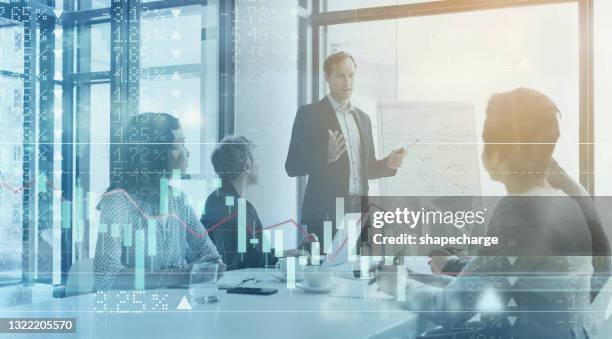 digitally enhanced shot of a group of businesspeople meeting in the boardroom superimposed over a graph showing the ups and downs of the stock market - man double exposure profit concept stock pictures, royalty-free photos & images