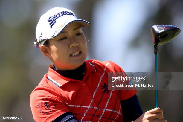 Nasa Hataoka of Japan hits her tee shot on the ninth hole playoff against Yuka Saso of the Philippines during the final round of the 76th U.S....