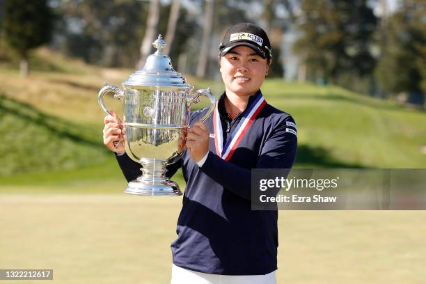 Yuka Saso of the Philippines celebrates with the Harton S. Semple Trophy after winning the 76th U.S. Women's Open Championship at The Olympic Club on...