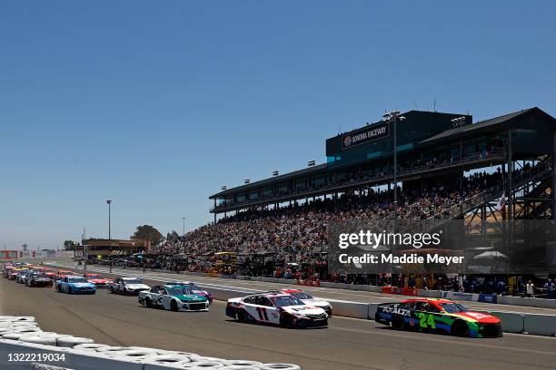 William Byron, driver of the Axalta Chevrolet, Denny Hamlin, driver of the FedEx Express Toyota, and Austin Dillon, driver of the Congressional...