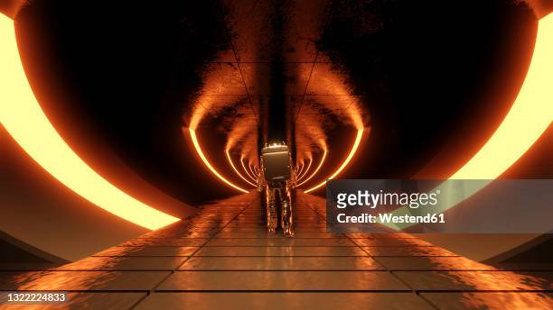 three dimensional render of lone astronaut exploring futuristic corridor illuminated by orange glowing arches - spaceman stock illustrations