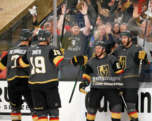 Alex Pietrangelo, Reilly Smith, Jonathan Marchessault and Nicolas Roy of the Vegas Golden Knights celebrate Marchessault's second-period power-play...
