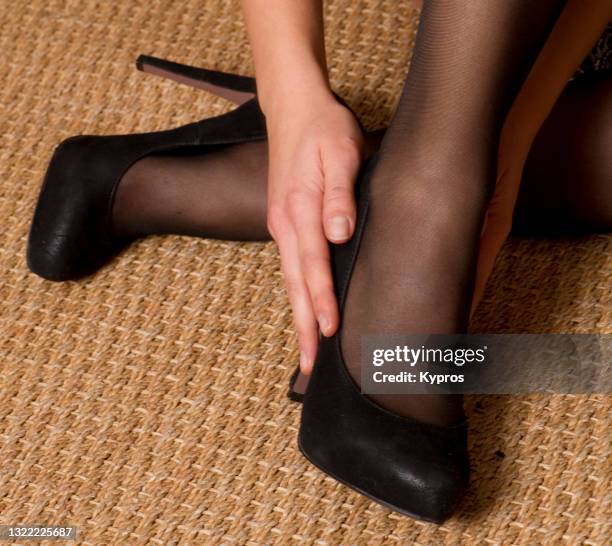 young woman's legs with high heels - nylon feet 個照片及圖片檔