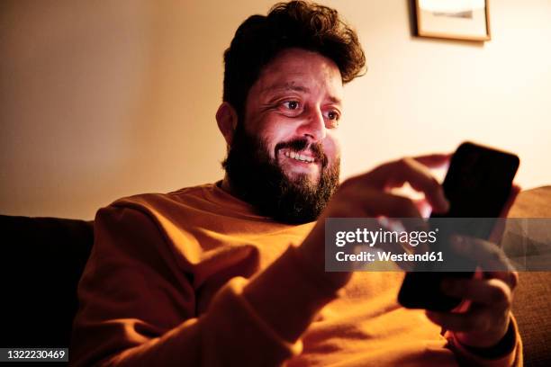 Man Using Cell Phone Light Face Light Phone Face Photos and Premium High Res Pictures - Getty Images