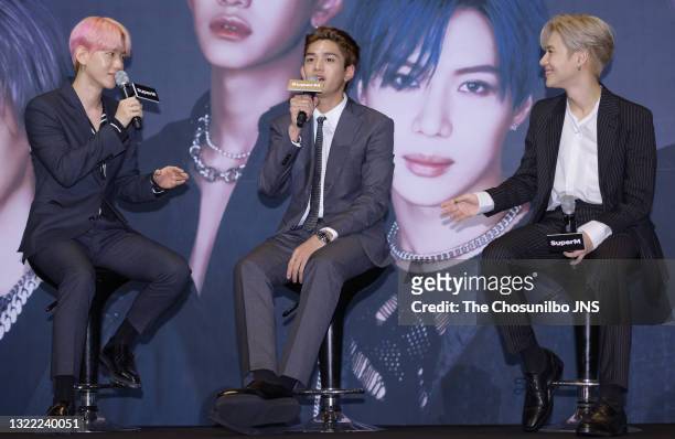 Baekhyun, Lucas, Taemin of SuperM attend the press conference at Dragon City Hotel on October 02, 2019 in Seoul, South Korea.