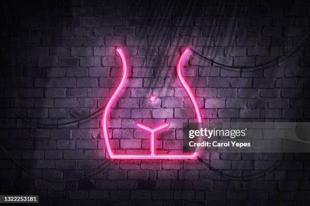 woman pink shape in neon lights - body types stock pictures, royalty-free photos & images