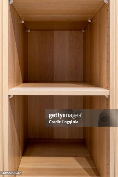 wooden cabinet - kühlschrank leer stock-fotos und bilder