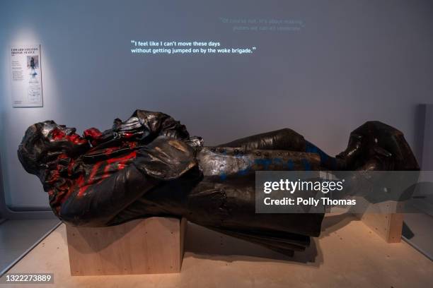 The toppled statue of Edward Colston lies on display in M Shed museum on June 7, 2021 in Bristol, England. The controversial bronze statue of 17th...