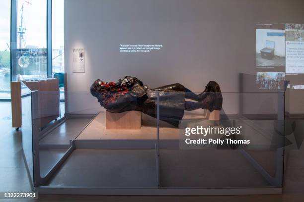 The toppled statue of Edward Colston lies on display in M Shed museum on June 7, 2021 in Bristol, England. The controversial bronze statue of 17th...