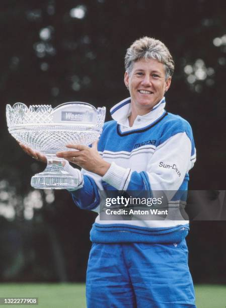 Patty Sheehan of the United States holds the champion golfer trophy after winning the Weetabix Women's British Open golf tournament on 15th August...