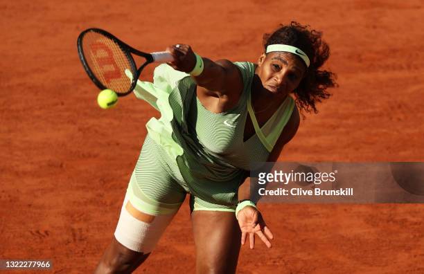Serena Williams of USA serves during her Women's Singles fourth round match against Elena Rybakina of Kazakhstan on day eight of the 2021 French Open...