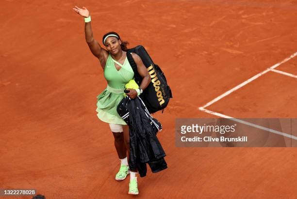 Serena Williams of USA waves goodbye to the crowd after her straight sets defeat in her Women's Singles fourth round match against Elena Rybakina of...