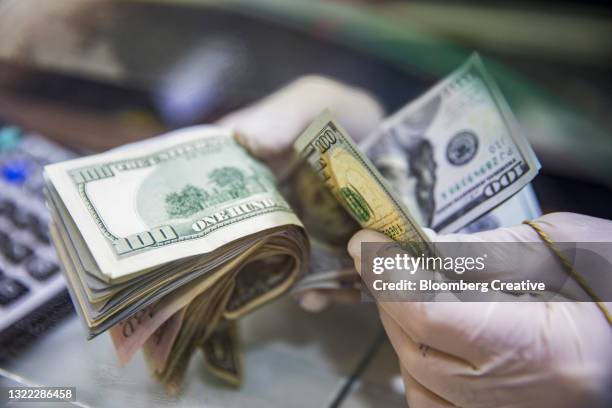american u.s. 100 dollar bills - exchange rates stock pictures, royalty-free photos & images