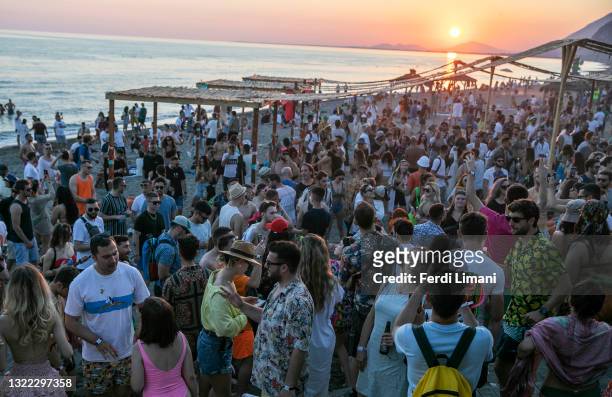 People dance at the Unum festival venue at Rana e Hedhun beach on June 5, 2021 in Shengjin, Albania. International electronic musicians like Ben...