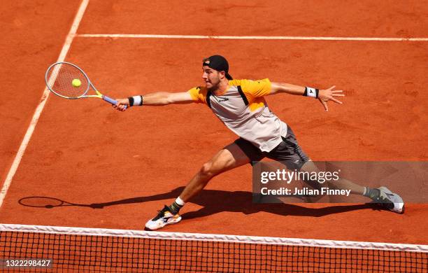 Jan-Lennard Struff of Germany plays a forehand in their mens singles fourth round match against Diego Schwartzman of Argentina during day nine of the...